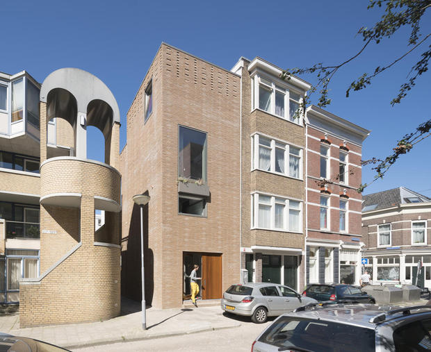 This townhouse has bricks made up of industrial waste