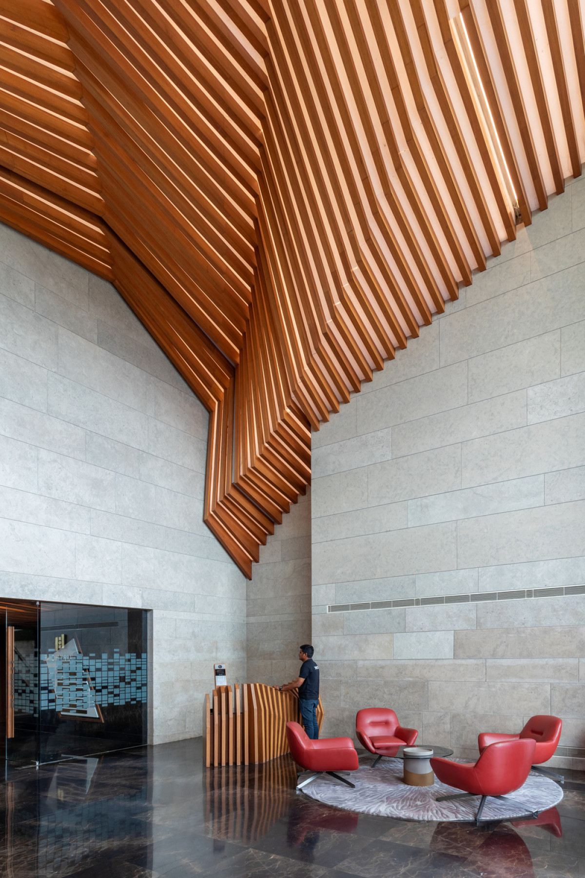 Each building is entered through a sculptural lobby