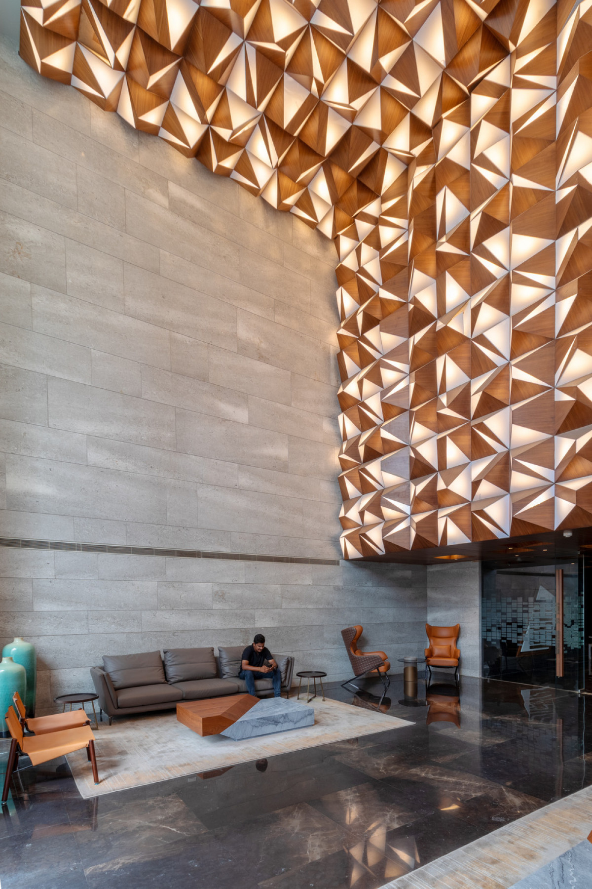 Each building is entered through a sculptural lobby