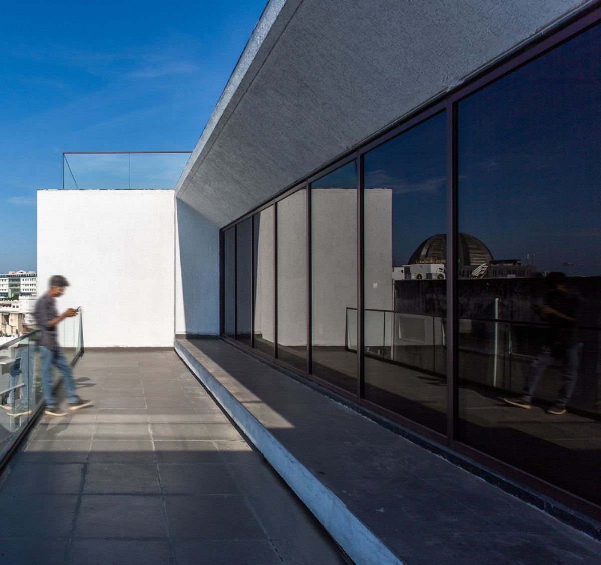 Each office opens into a linear terrace. Photo credit: BRS Sreenag, Sreenag Pictures