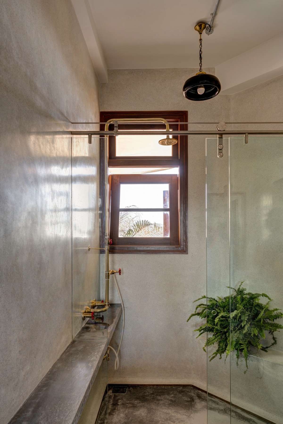 Master bathroom with terrazzo finish on walls and IPS flooring