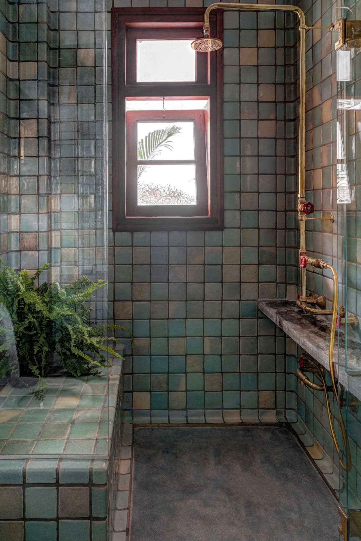 Guest Bathroom - Handmade curved tiles laid in place with brass-ware