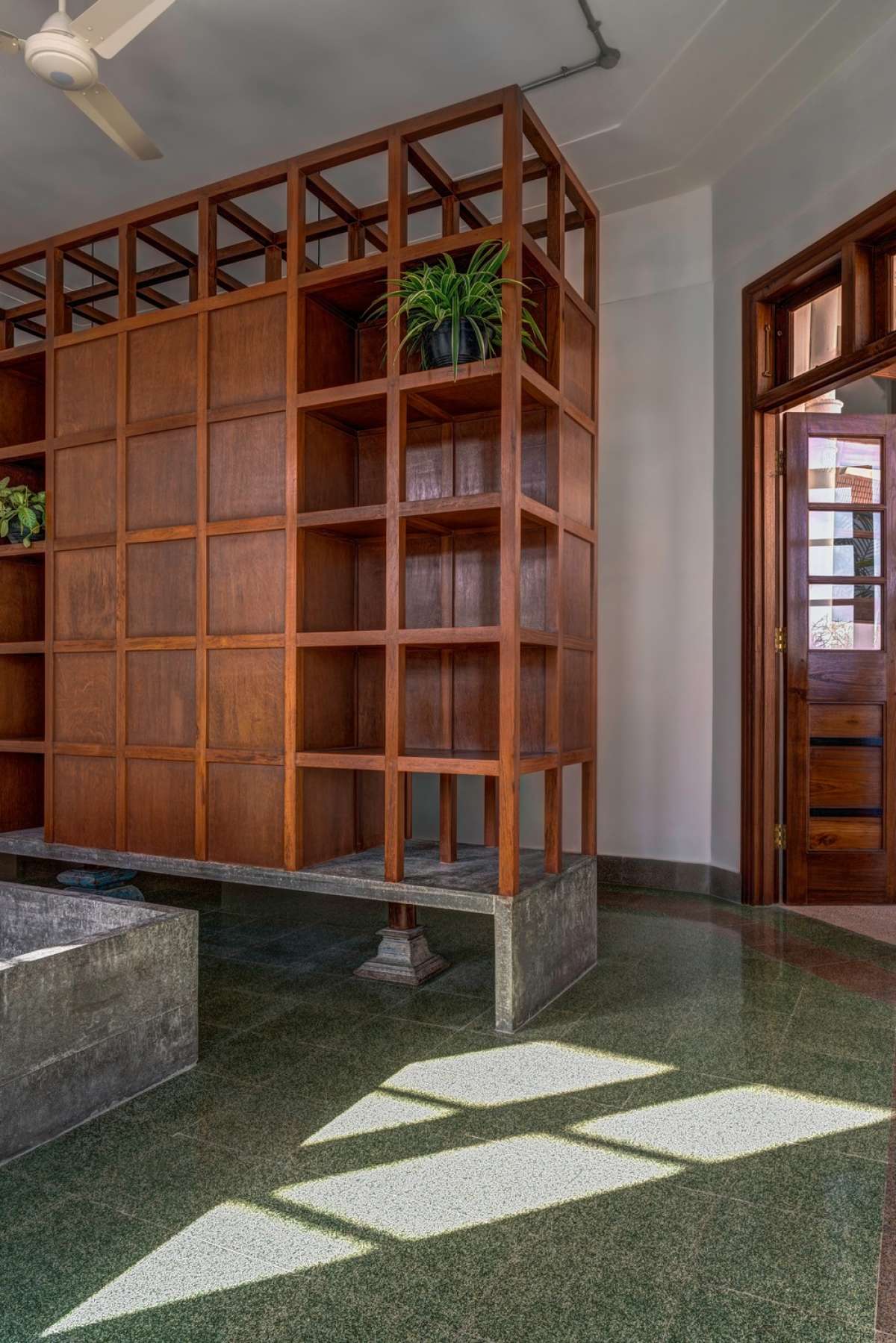 Master Bedroom - wooden storage supported by concrete bench