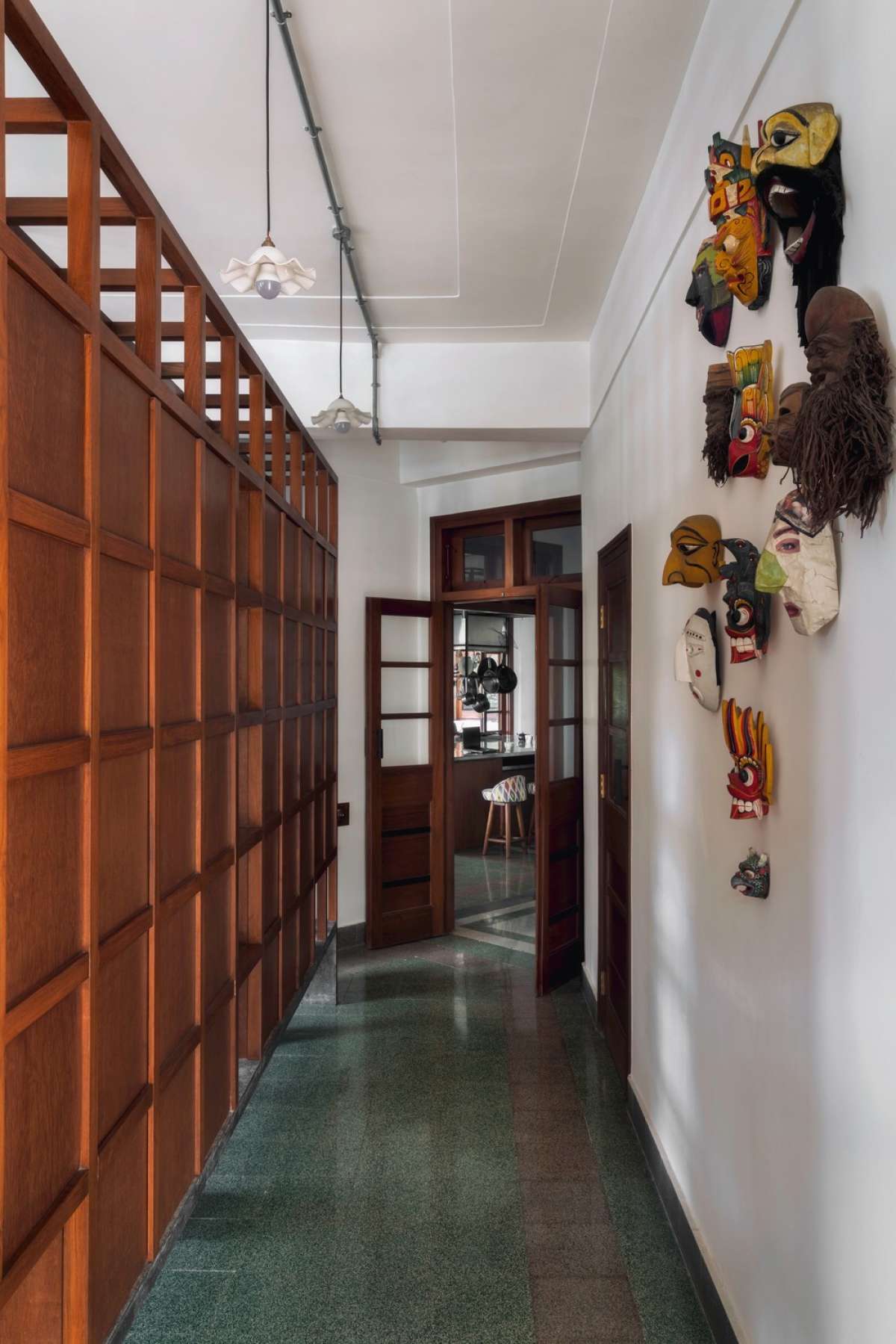 Master Bedroom - central corridor extend into the bedroom to create axial transparency