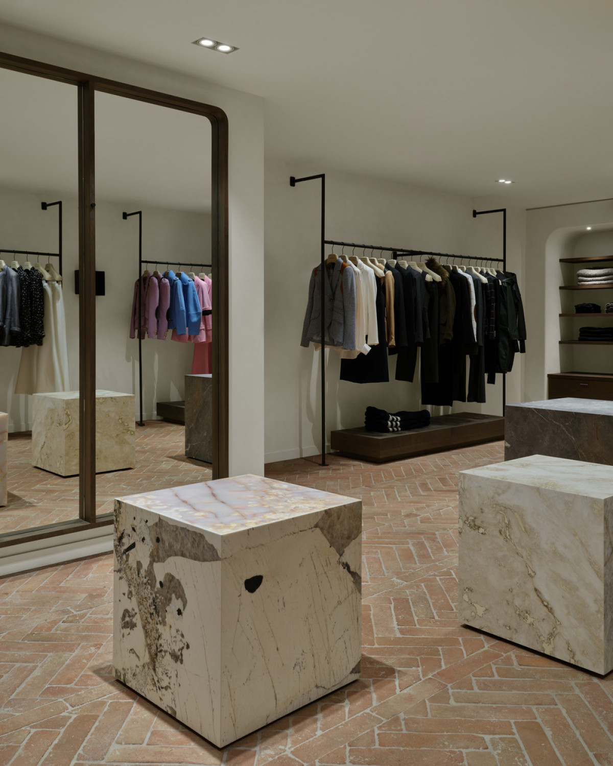 Stone and onyx off-cuts were used to clad four display islands, each of different proportions.